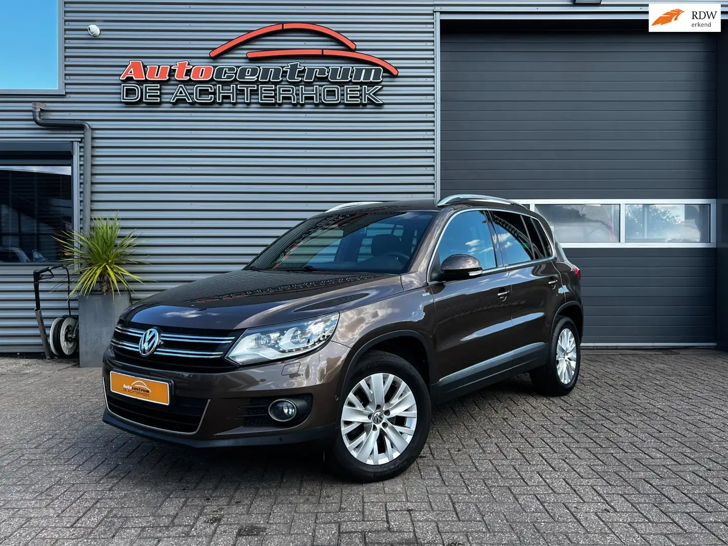 Volkswagen Tiguan 1.4 TSI Sport&Style Life 160PK | NAVI | Cruise Brun - 1