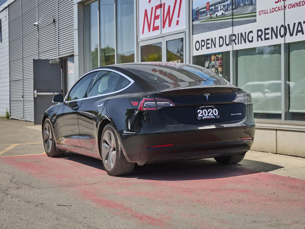 Tesla Model 3 photo Tesla Model 3