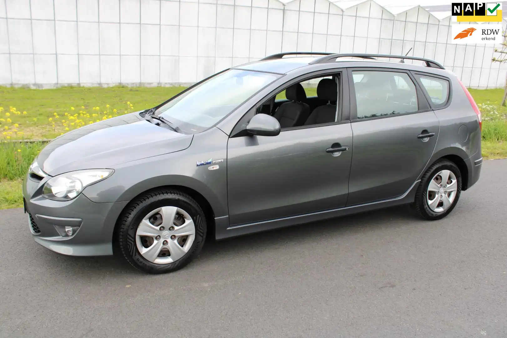 Hyundai i30 CW 1.4i i-Drive Cool met Airco Grijs - 1