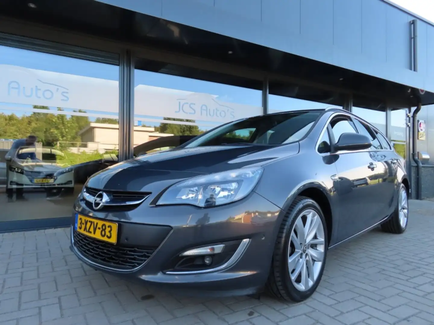Opel Astra 1.4 Turbo Cosmo Ecc Cruise Navi Camera 18 Inch 201 Grijs - 1