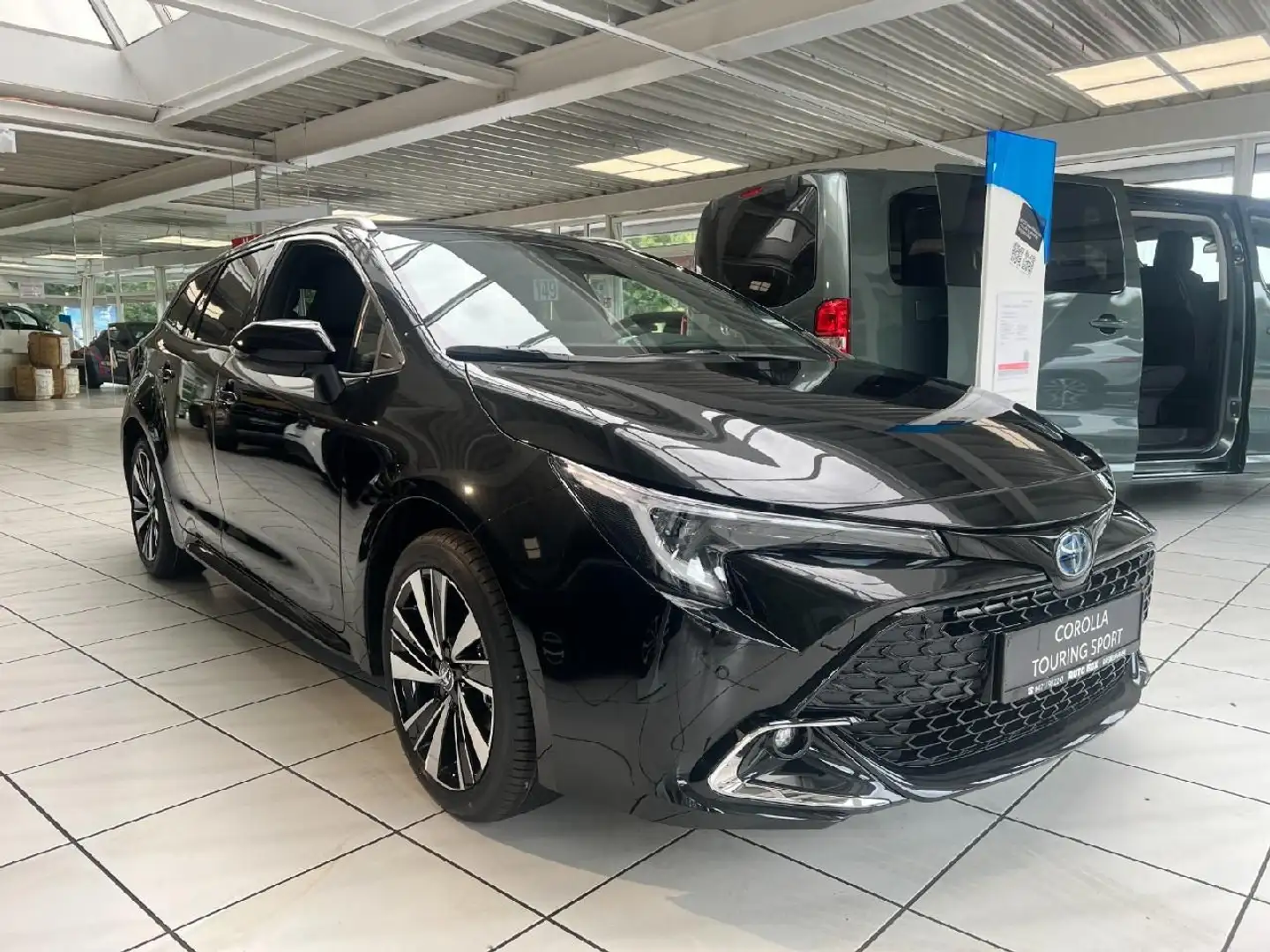 Toyota Corolla TS 2.0l Hybrid Teamplayer + Technikpaket Schwarz - 1