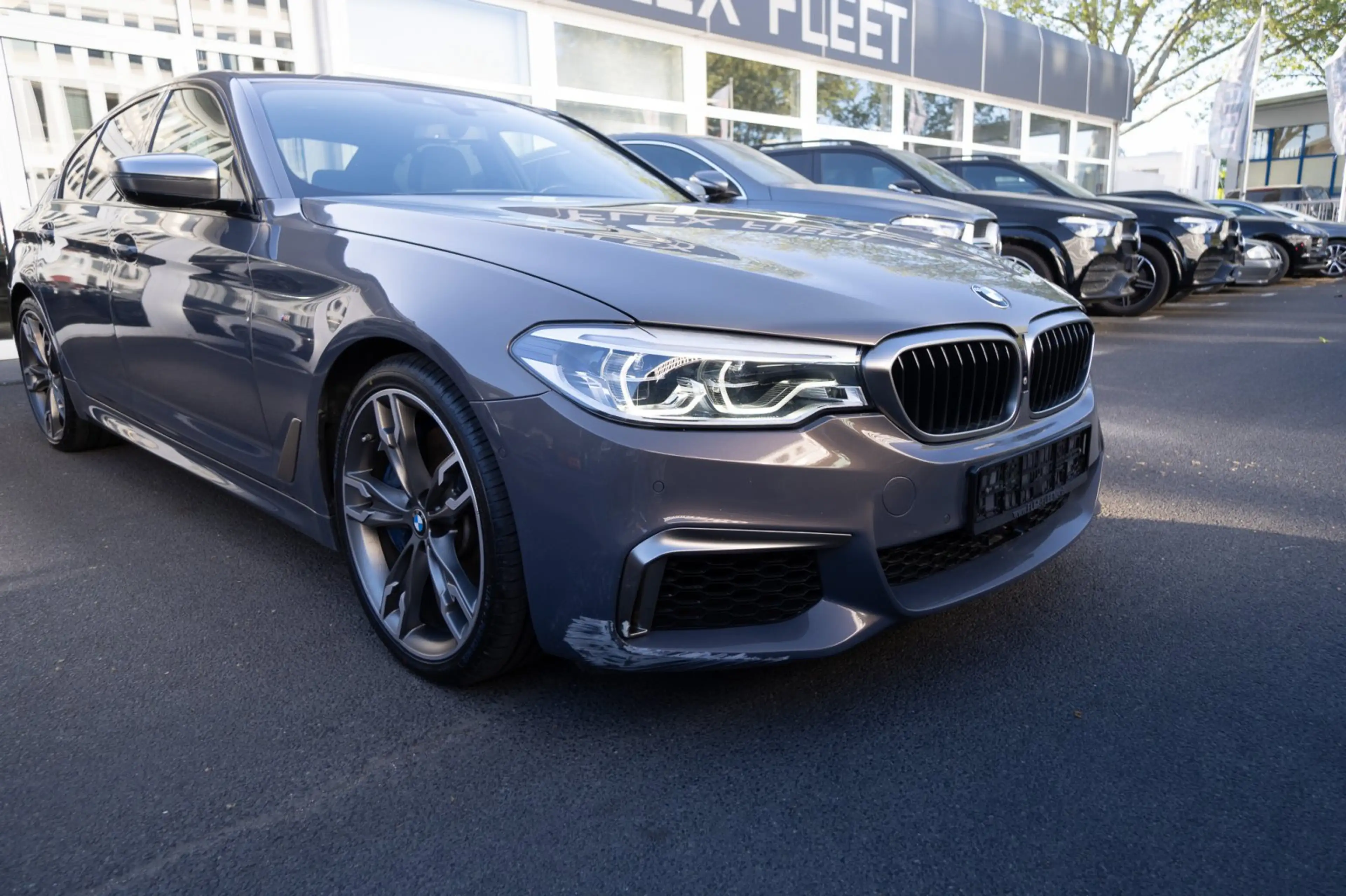 BMW M550 i xDrive *CHAMPAGNER QUARZ* — photo 10