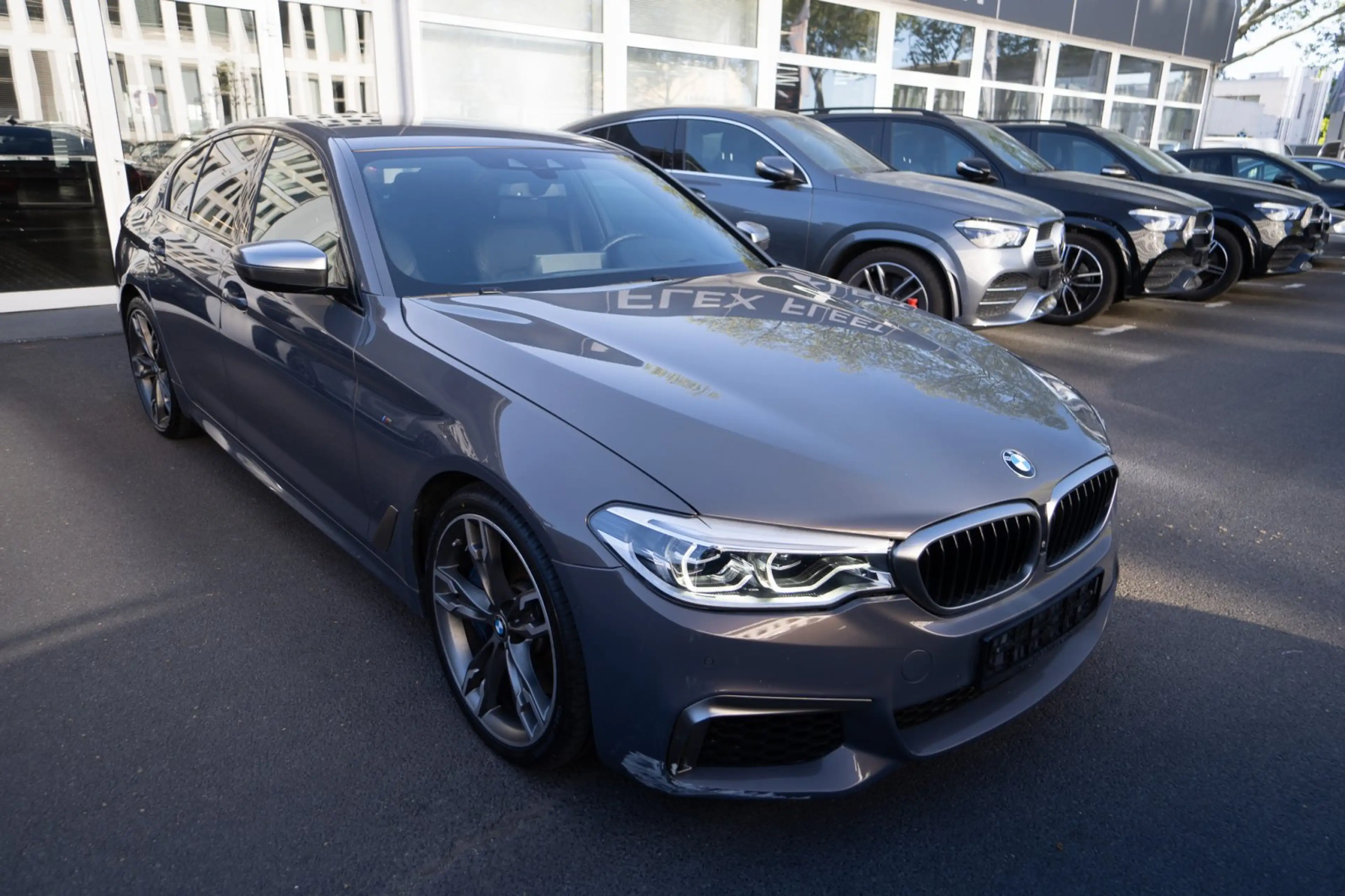 BMW M550 i xDrive *CHAMPAGNER QUARZ* — photo 12