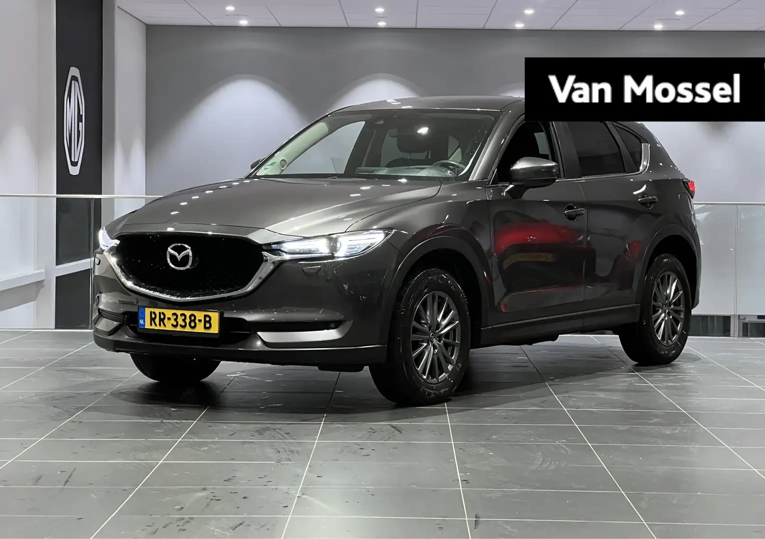 Mazda CX-5 2.0 SkyActiv-G 165pk Aut. TS+ | 1e-Eig. | Navi | T Grijs - 1