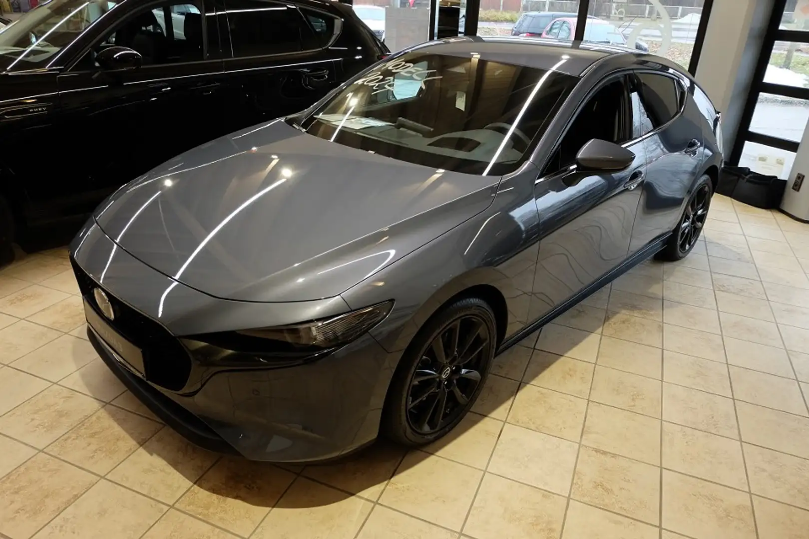 Mazda 3 2.0L e-SKYACTIV X 5T 6AG EXCLUSIVE DASO DESI Gris - 2