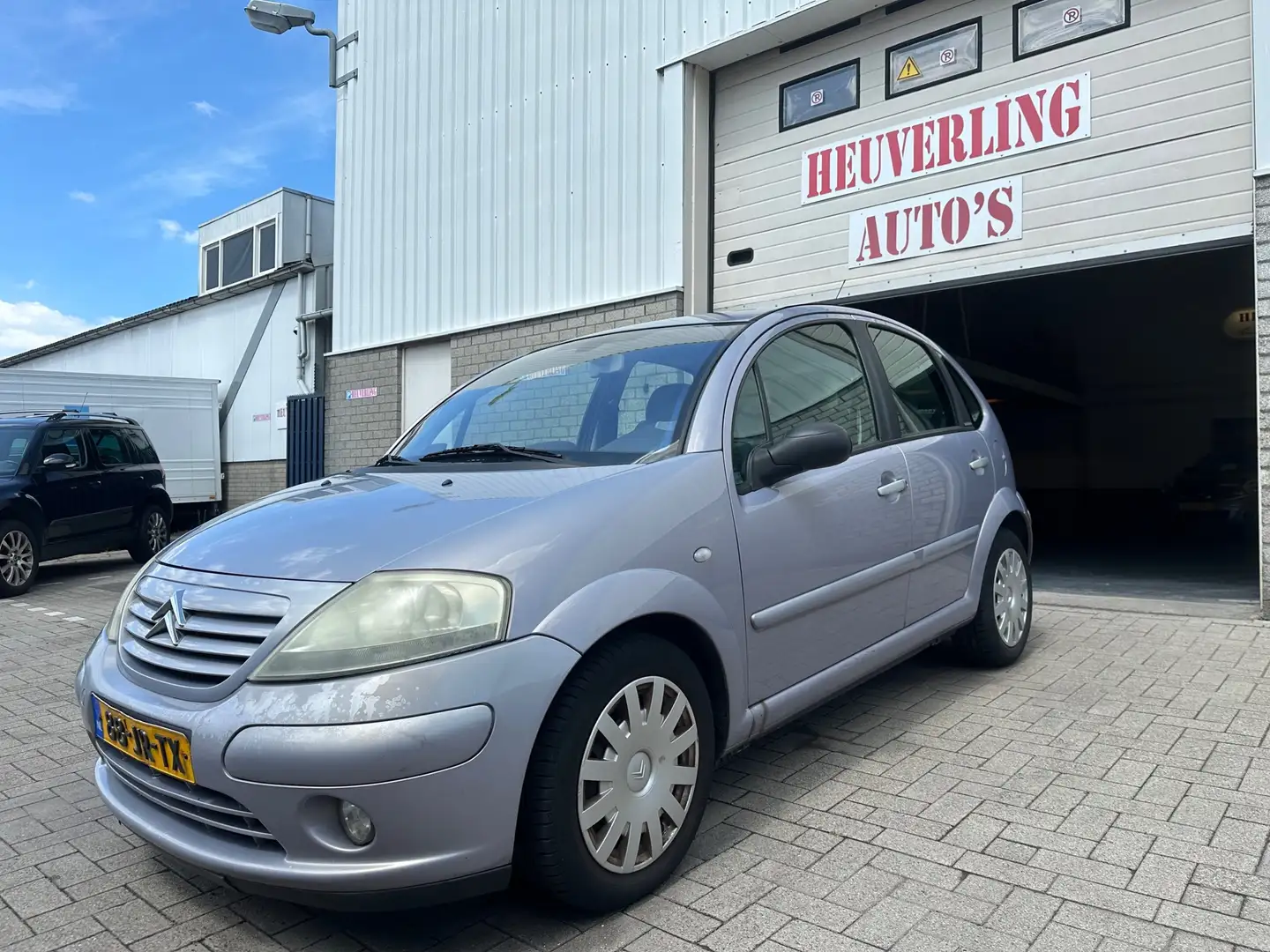 Citroen C3 1.4i Exclusive | Clima | APK Gris - 1