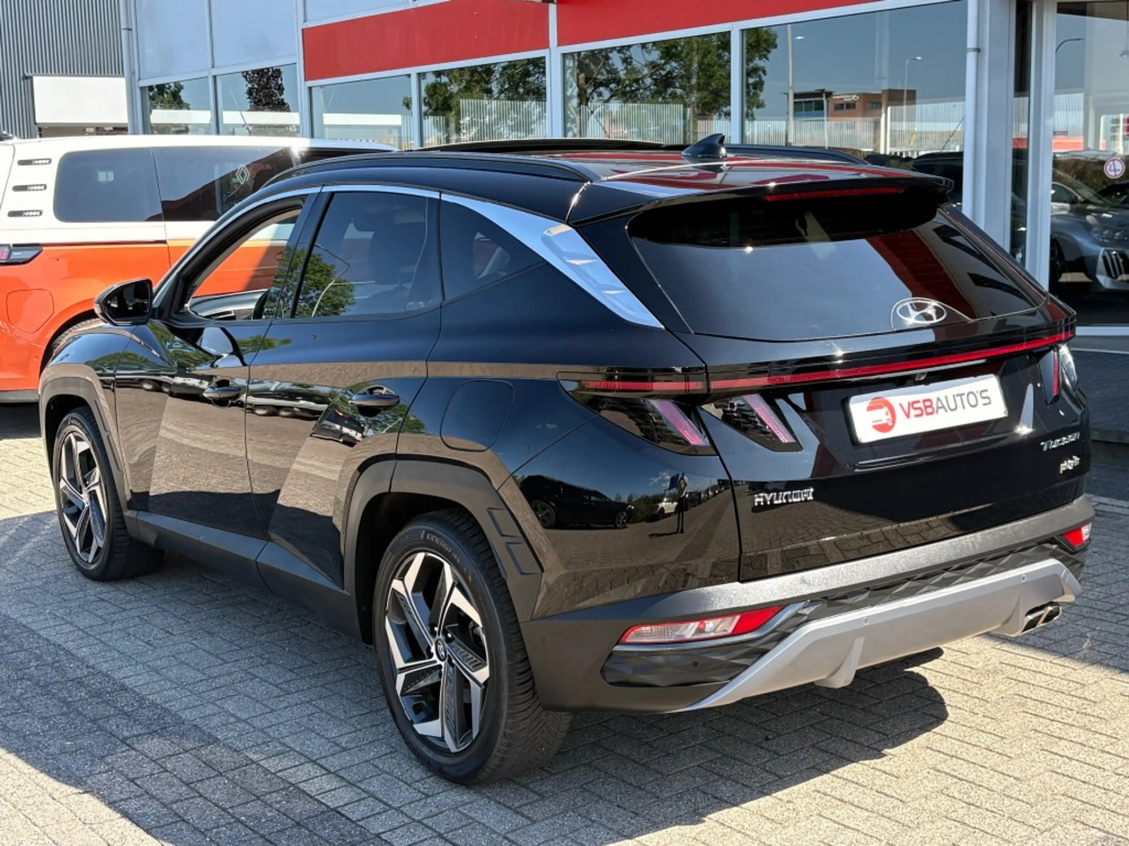 Hyundai TUCSON 1.6 T-GDI AUT. PHEV 4WD 265PK PANO-DAK LEER NAVI C — photo 3