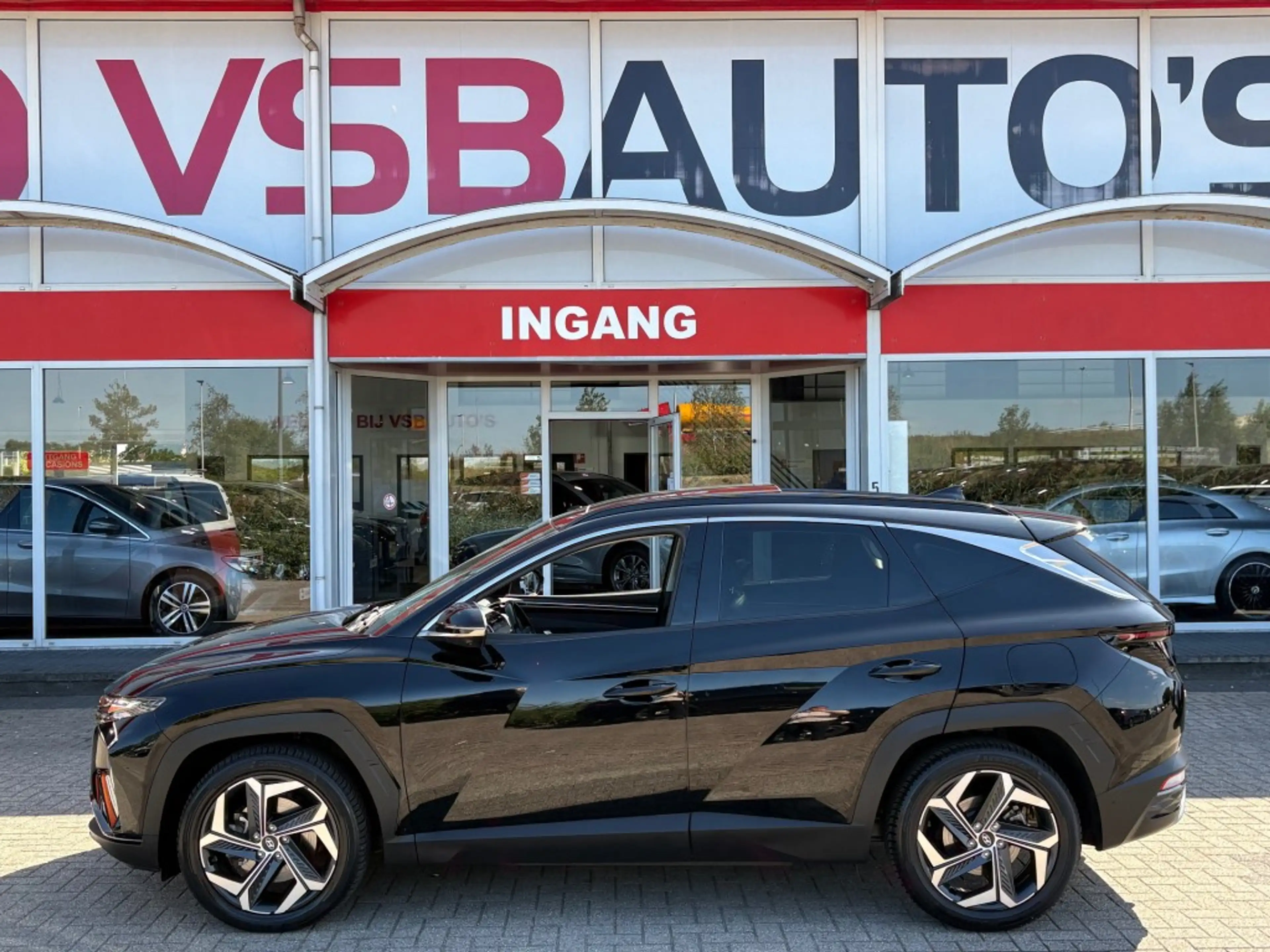 Hyundai TUCSON 1.6 T-GDI AUT. PHEV 4WD 265PK PANO-DAK LEER NAVI C — photo 2