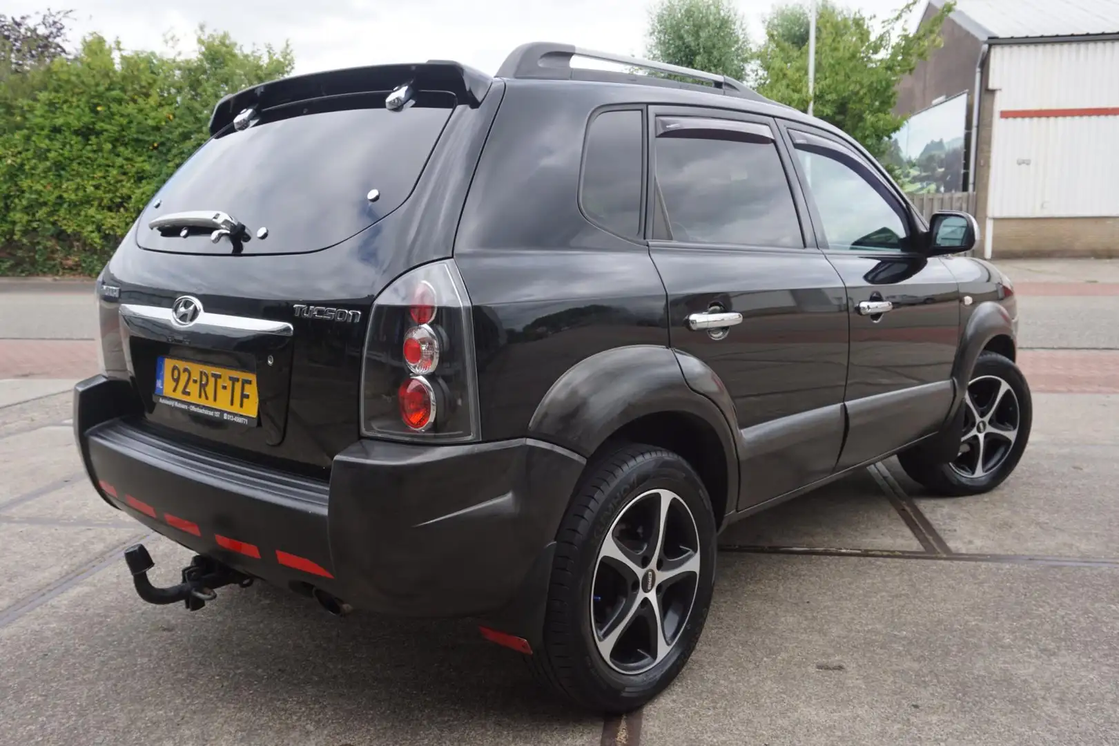 Hyundai TUCSON 2.0i Dynamic * Airco * Negro - 2