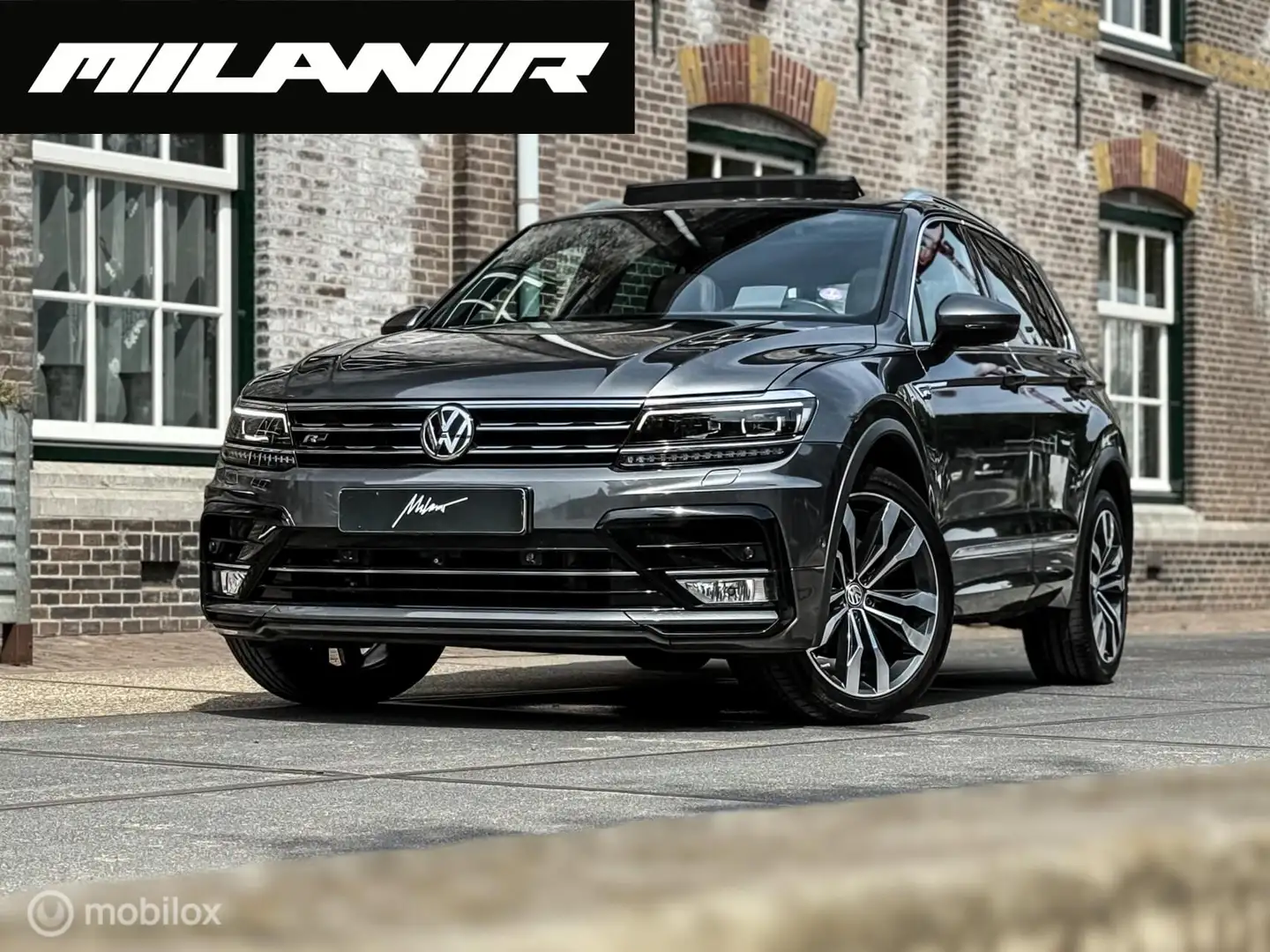 Volkswagen Tiguan 2.0 TSI 4Motion Highline|Pano|HUD|Dinaudio Grijs - 1