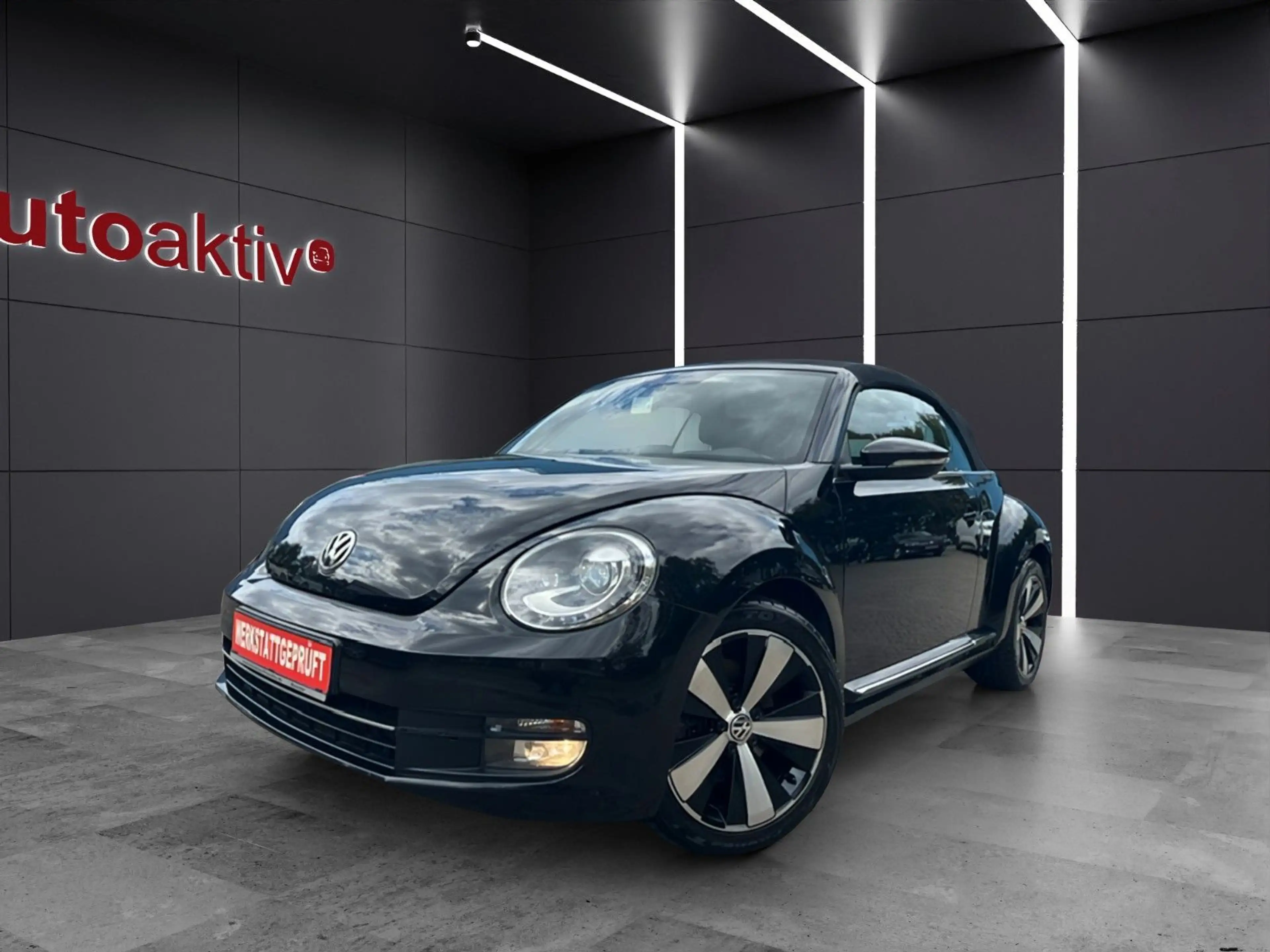 Volkswagen Beetle Cabriolet Exclusive Design/Voll Leder/1HD — photo 2