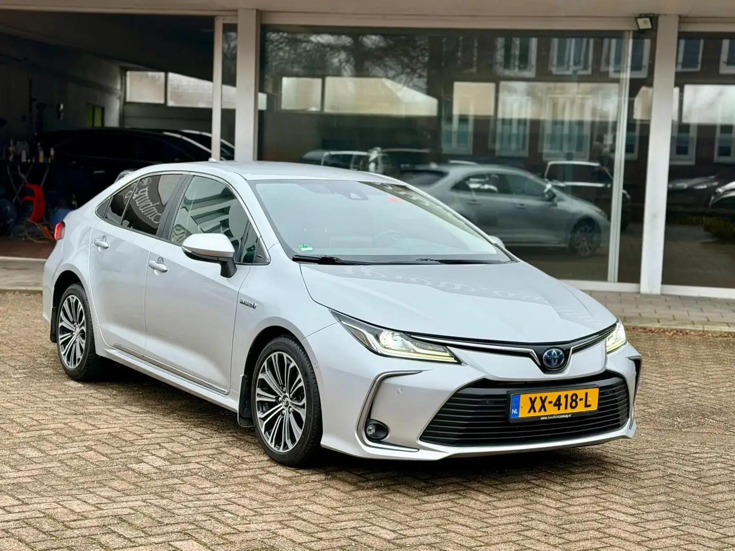 Toyota Corolla 1.8 Hybrid Style|Nieuwstaat|Origineel Nederlands|N Grau - 1