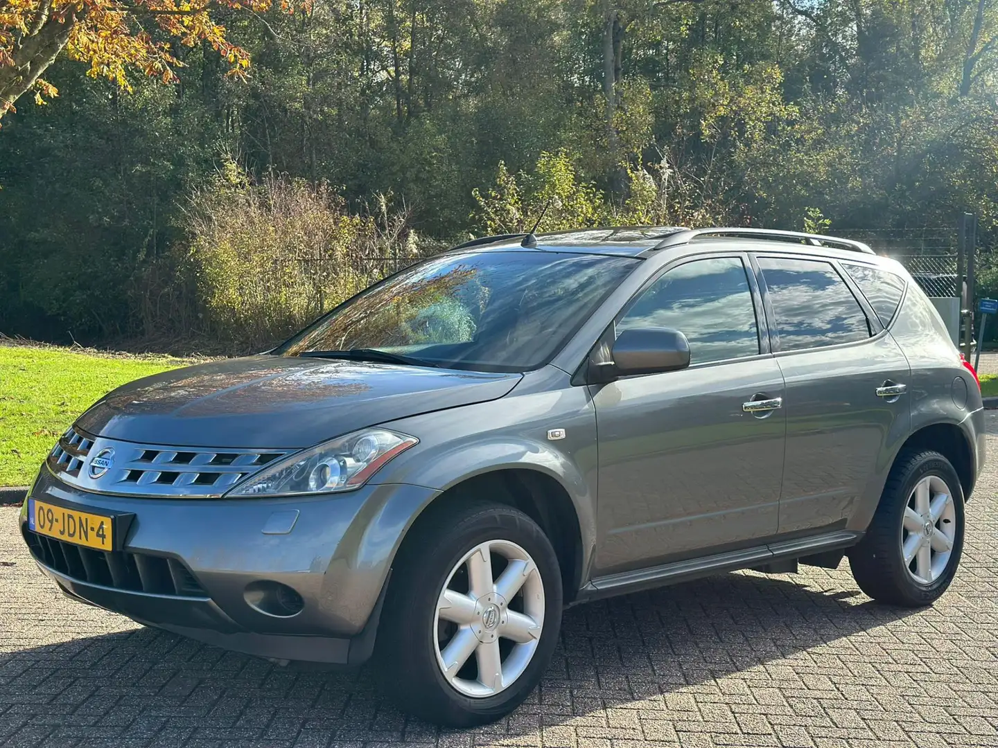 Nissan Murano 3.5 V6/AUTOMAAT/AIRCO/CRUISE/SCHUIFDAK/LEDER/NAVI/ Grijs - 1