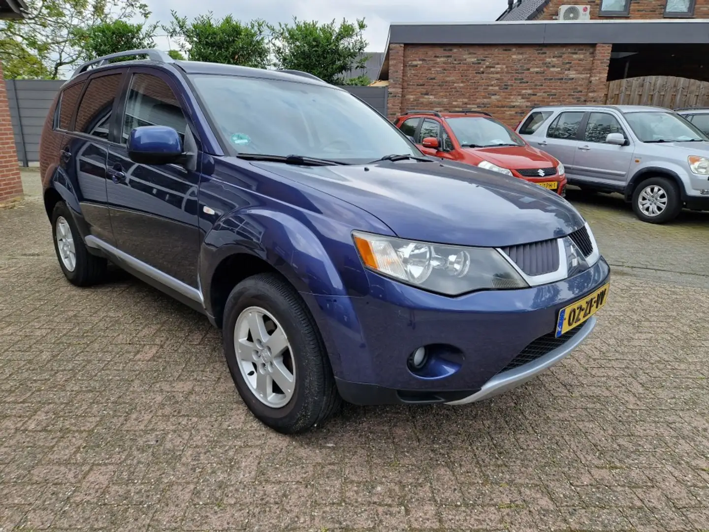 Mitsubishi Outlander 2.4i Intro Edition 2WD Airco Clima NL-auto Trekhaa Blau - 2