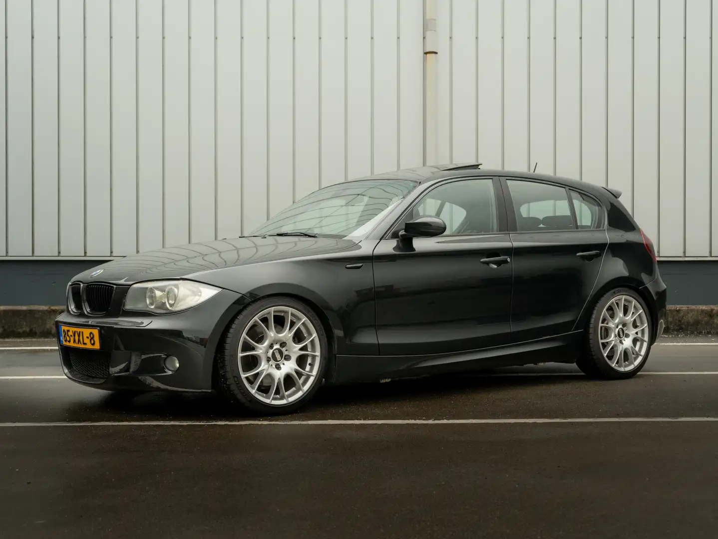 BMW 130 130i M Pakket | Sperdiff | ST Schroefset | BBS Schwarz - 1
