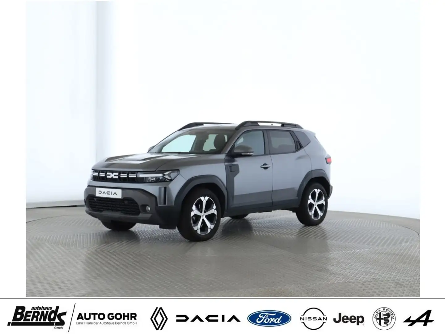 Dacia Duster TCe 130 Journey EINPARKHIFLE V+H+S NAVI KLIMAAUTO. Grau - 1