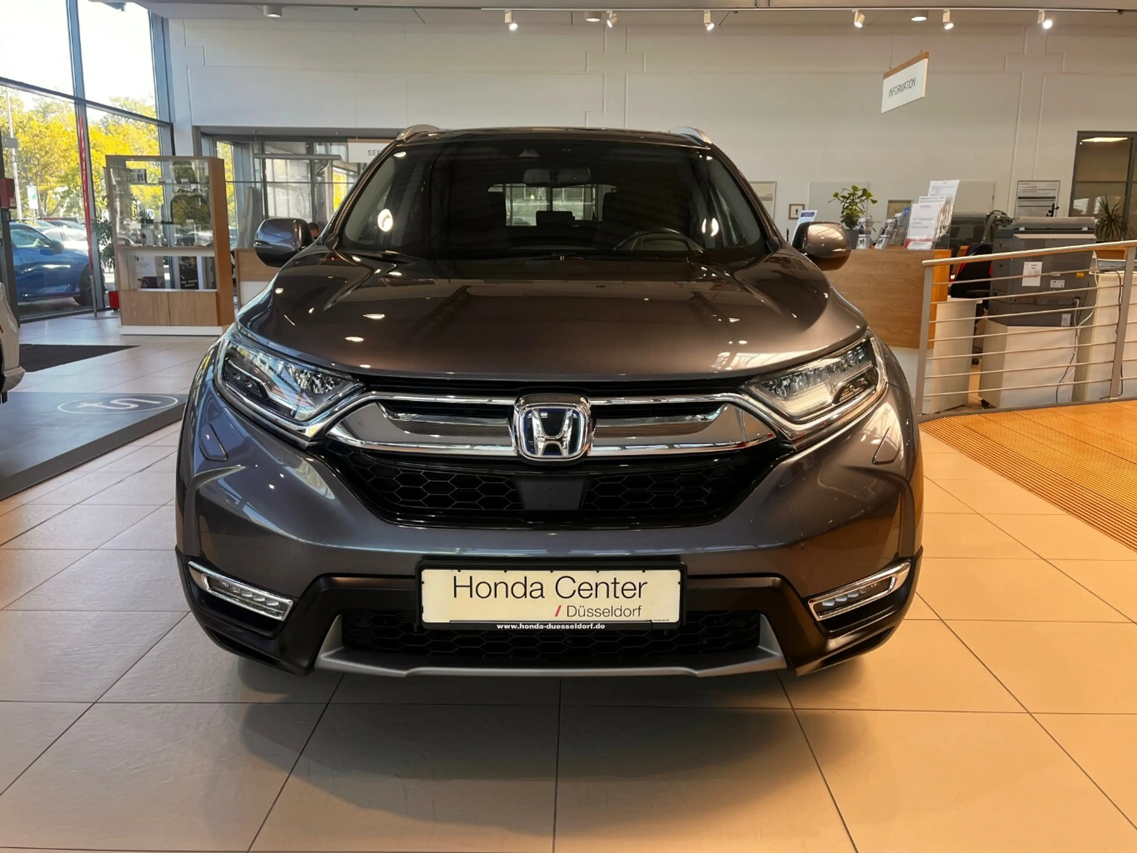 Honda CR-V 2.0 HYBRID 4WD Executive Pano|HUD|LED — photo 2