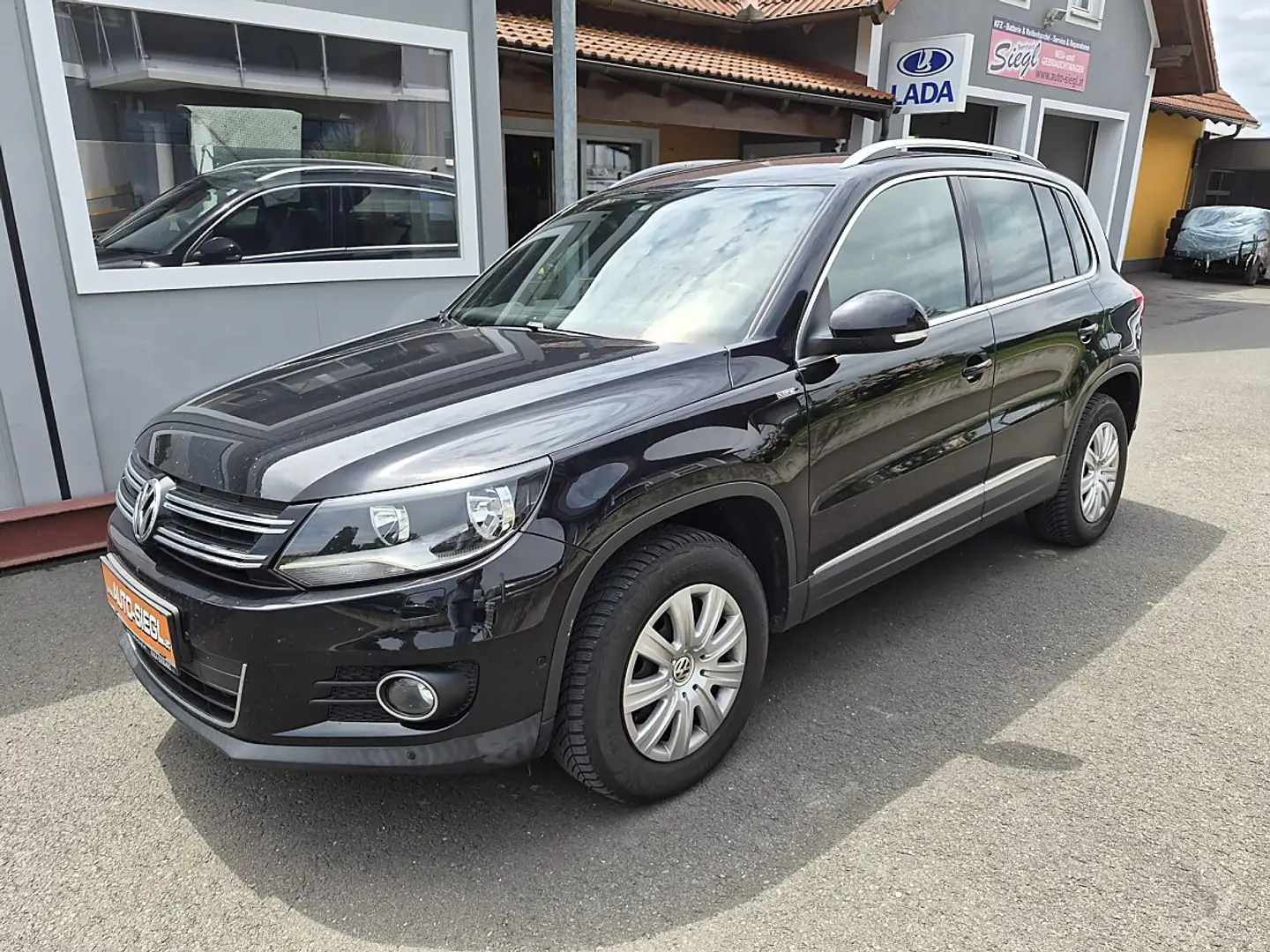 Volkswagen Tiguan 2,0 TDI BMT 4Motion LIFE Navi Modell 2014 Schwarz - 1