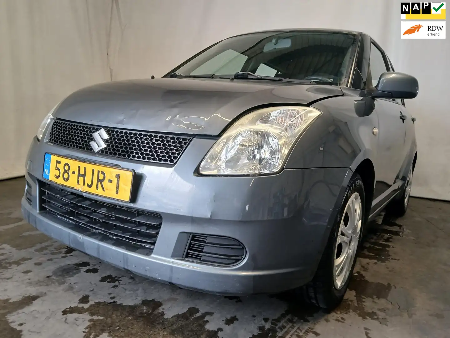 Suzuki Swift 1.3 GA - Airco - Schade Gri - 1