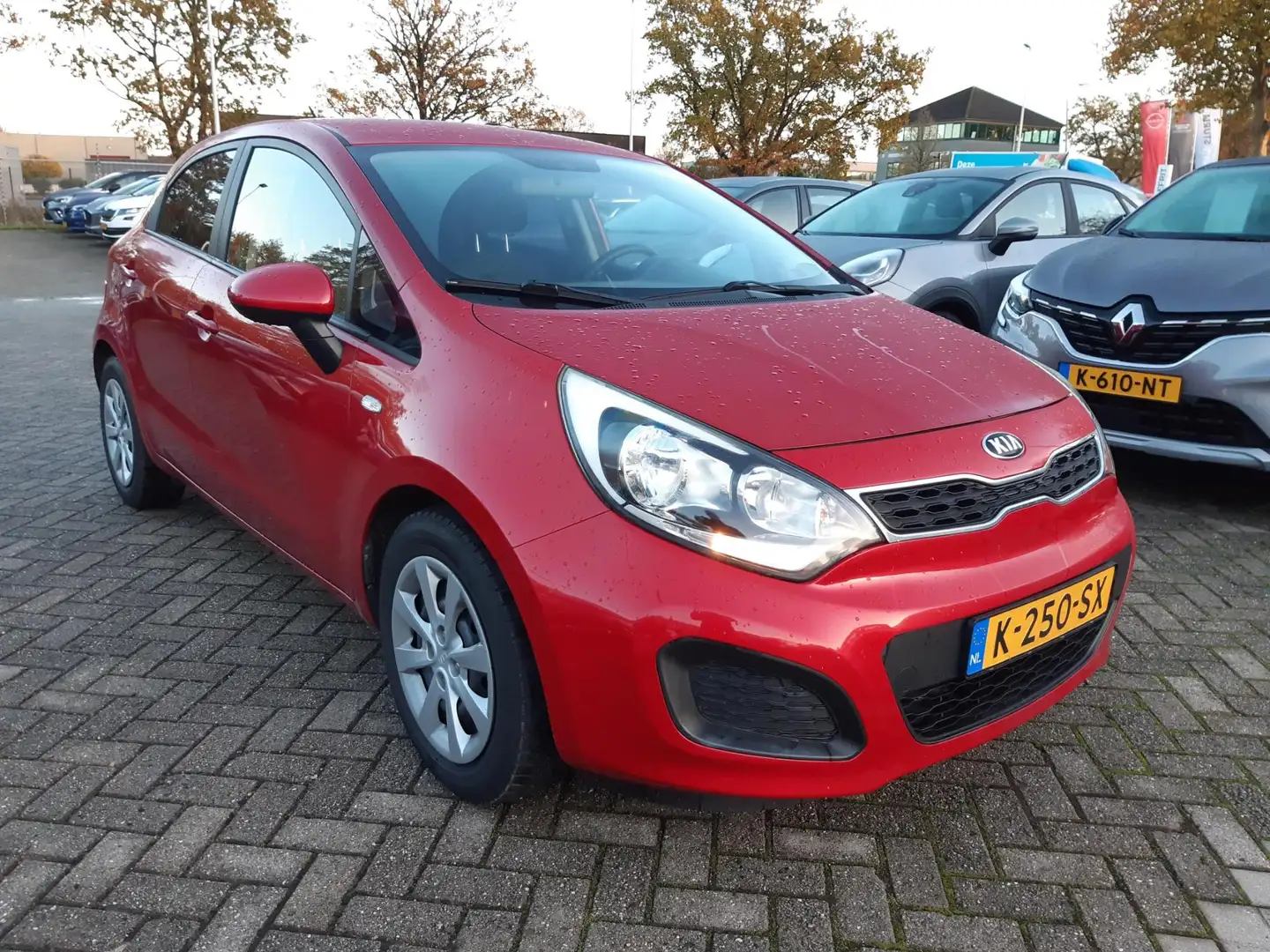 Kia Rio 1.2 CVVT BusinessLine | Airco | Parkeersensoren Ac Rood - 2