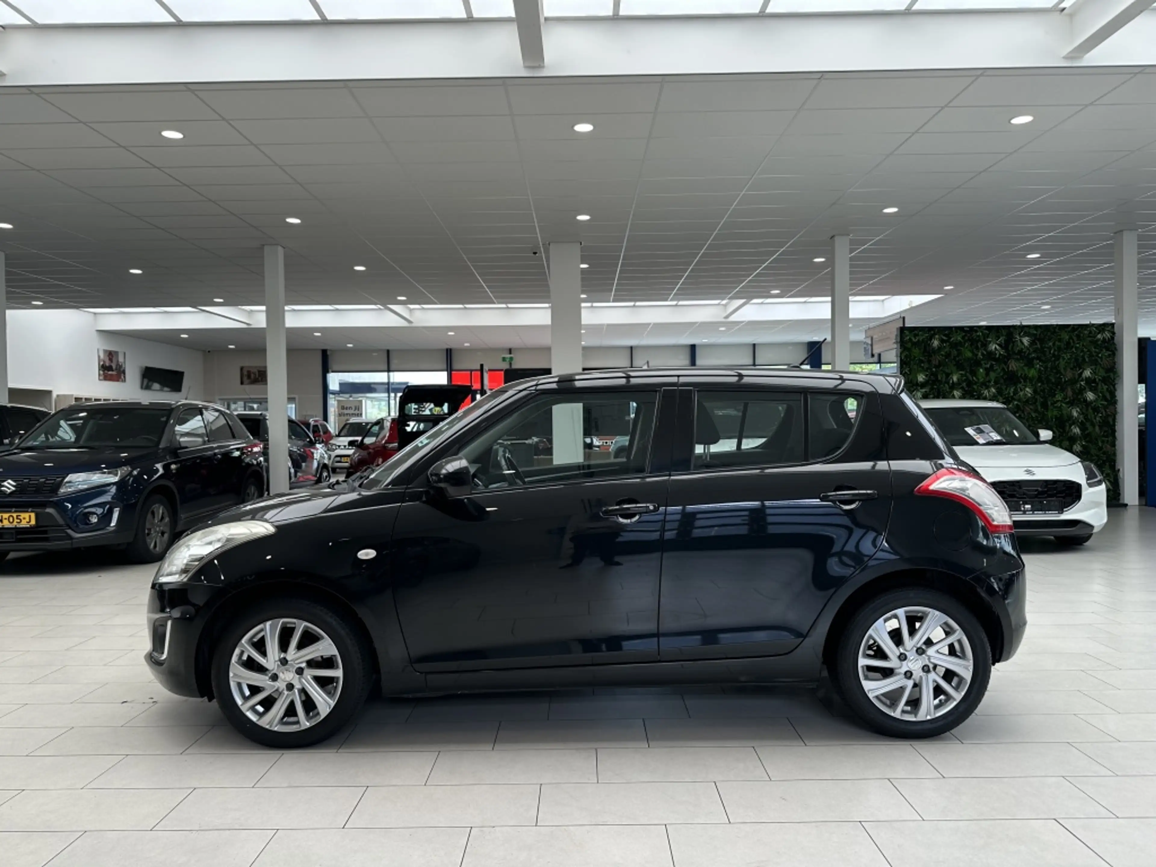 Suzuki Swift 1.2 Dynamic [ AIRCO I LAGE KM I 16 INCH I CRUISE ] — photo 7