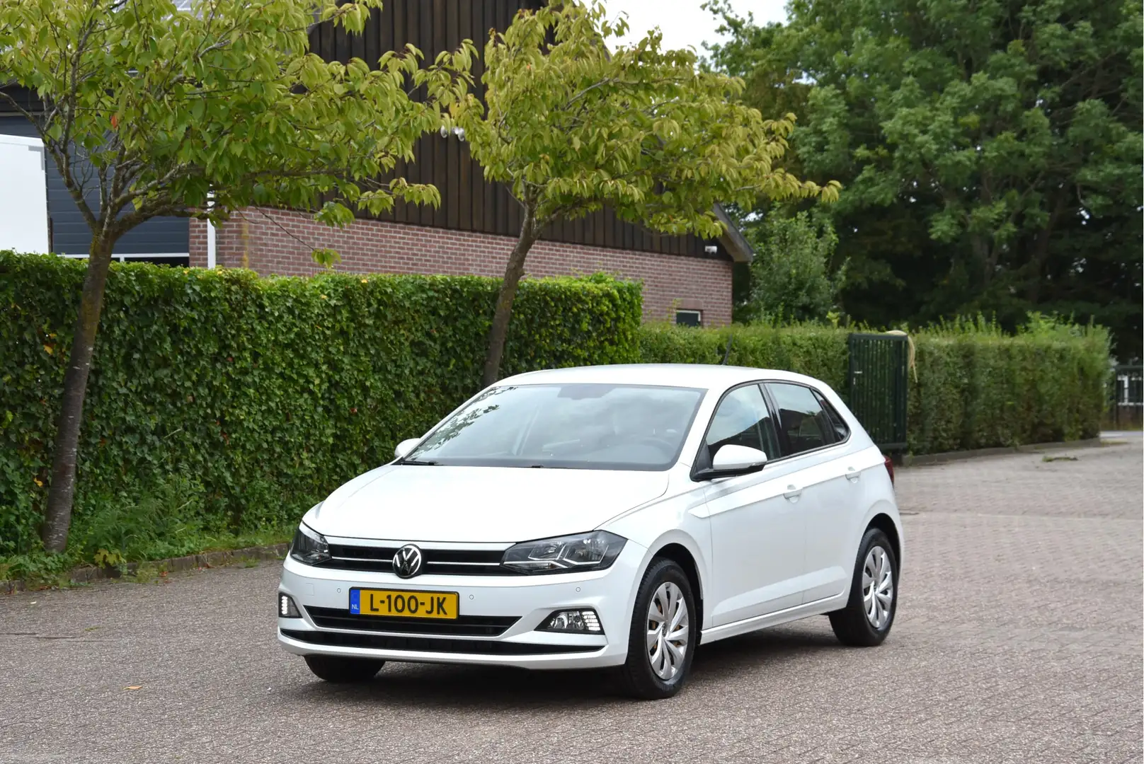 Volkswagen Polo 1.0 TSI 96 PK PDC ECC Carplay NAP 1e eigenaar Comf Wit - 1