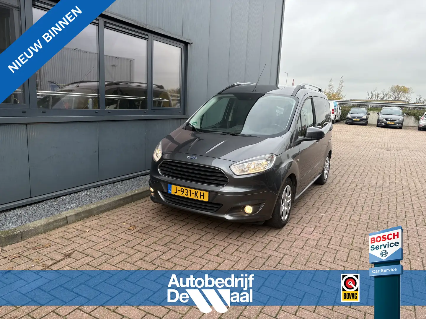 Ford Tourneo Courier 1.0 Ecoboost 100pk Titanium AIRCO/CRUISE/PDC/TREKH Gris - 1