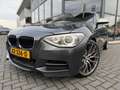 BMW 135 1-serie M135i xDrive High Executive | Automaat | P Gris - thumbnail 3