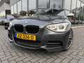 BMW 135 1-serie M135i xDrive High Executive | Automaat | P Gris - thumbnail 4
