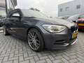 BMW 135 1-serie M135i xDrive High Executive | Automaat | P Gris - thumbnail 16