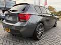 BMW 135 1-serie M135i xDrive High Executive | Automaat | P Gris - thumbnail 14