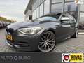 BMW 135 1-serie M135i xDrive High Executive | Automaat | P Gris - thumbnail 1