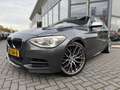 BMW 135 1-serie M135i xDrive High Executive | Automaat | P Gris - thumbnail 2
