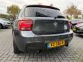 BMW 135 1-serie M135i xDrive High Executive | Automaat | P Gris - thumbnail 11