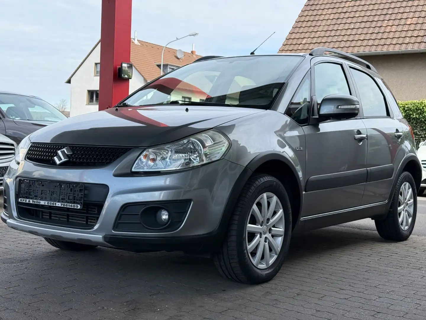 Suzuki SX4 Style 4x4/NAVI/SITZ&LENKRADHEIZUNG Szürke - 1
