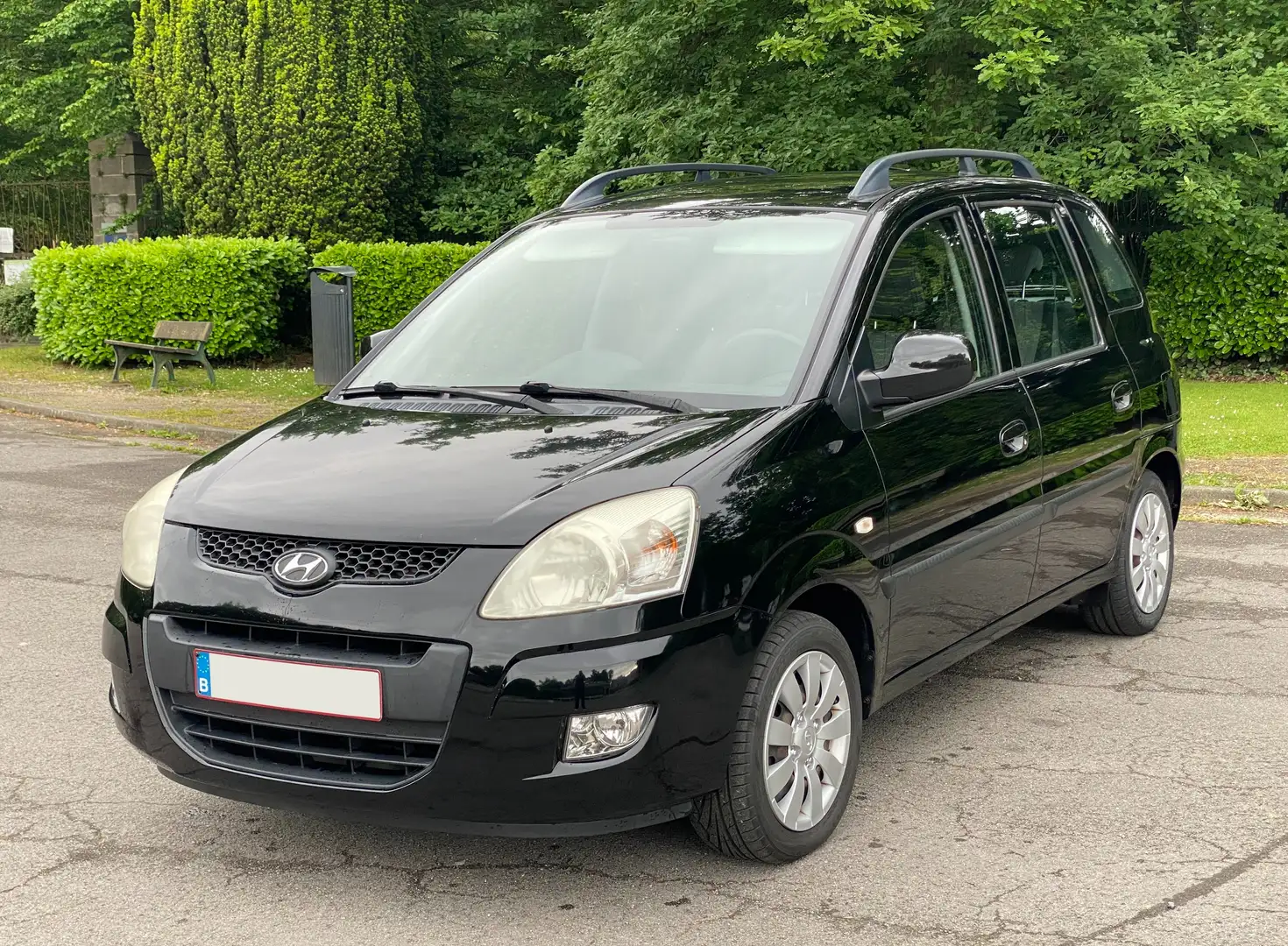 Hyundai Matrix 1.6i Essence Car-Pass Zwart - 1