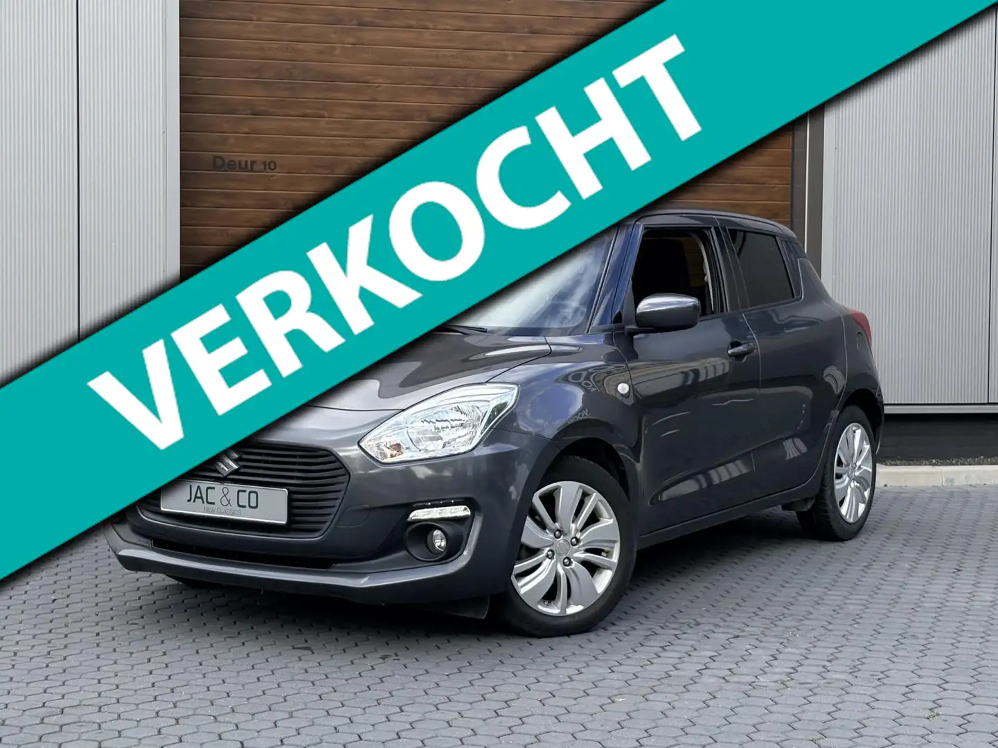 Suzuki Swift Model 2018 met Carplay-Camera-Stoelverwarming Gris - 1