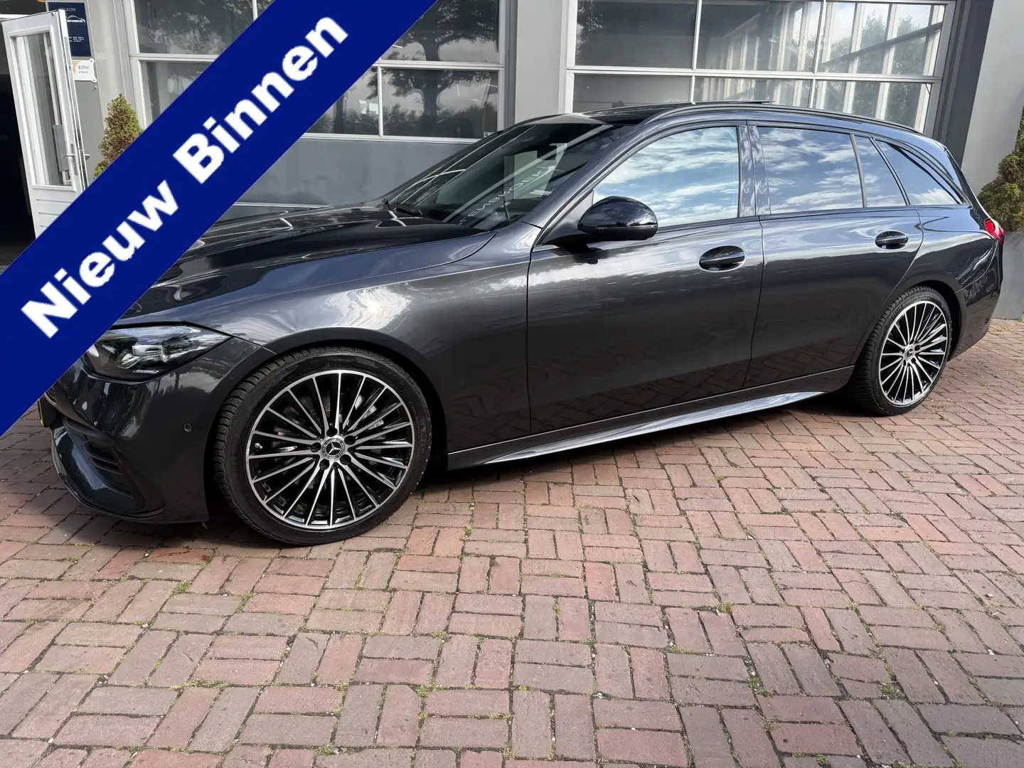 Mercedes-Benz C 180 Estate AMG Line | Pano | Sfeer | Leder |  01-2022 Grijs - 1