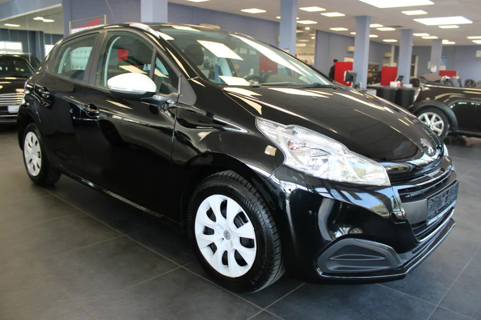 Peugeot 208 PureTech Klima - BT. Schwarz - 1