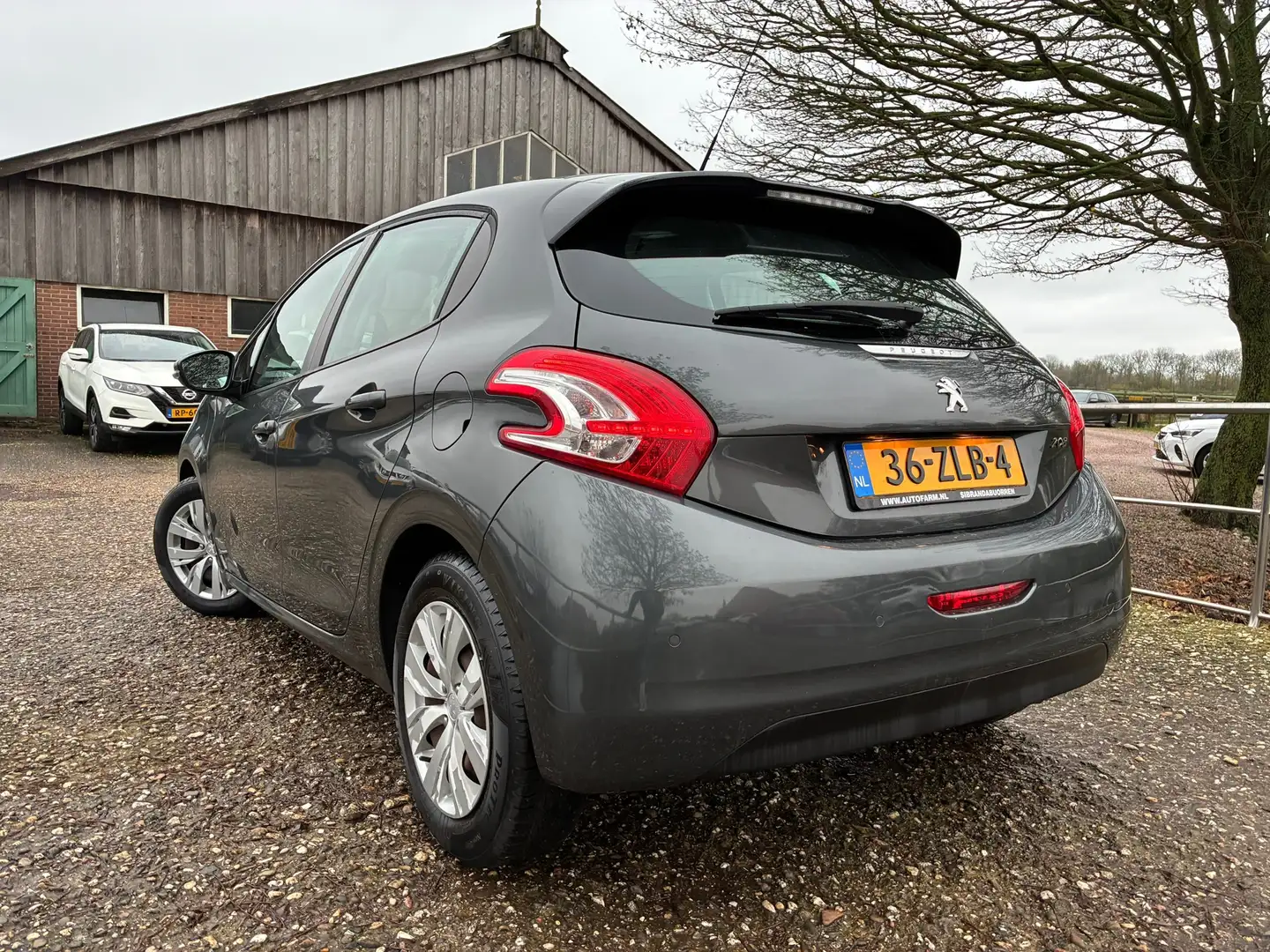 Peugeot 208 1.2 VTi Envy | Cruise + Clima nu € 5.450,-!!! Grijs - 2