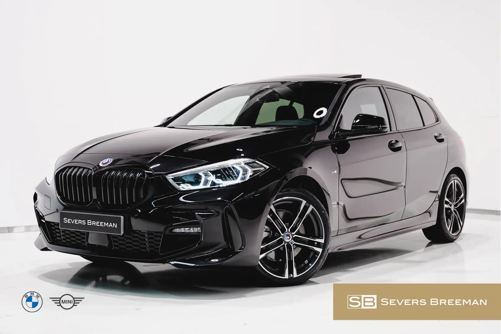 BMW 118 1 Serie 5-deurs 118i M Sportpakket Aut. Zwart - 1