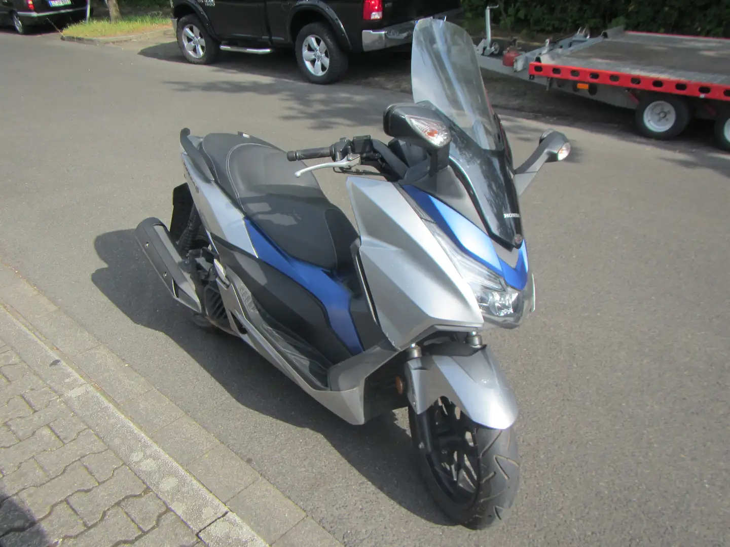 Honda Forza 125 Blauw - 1