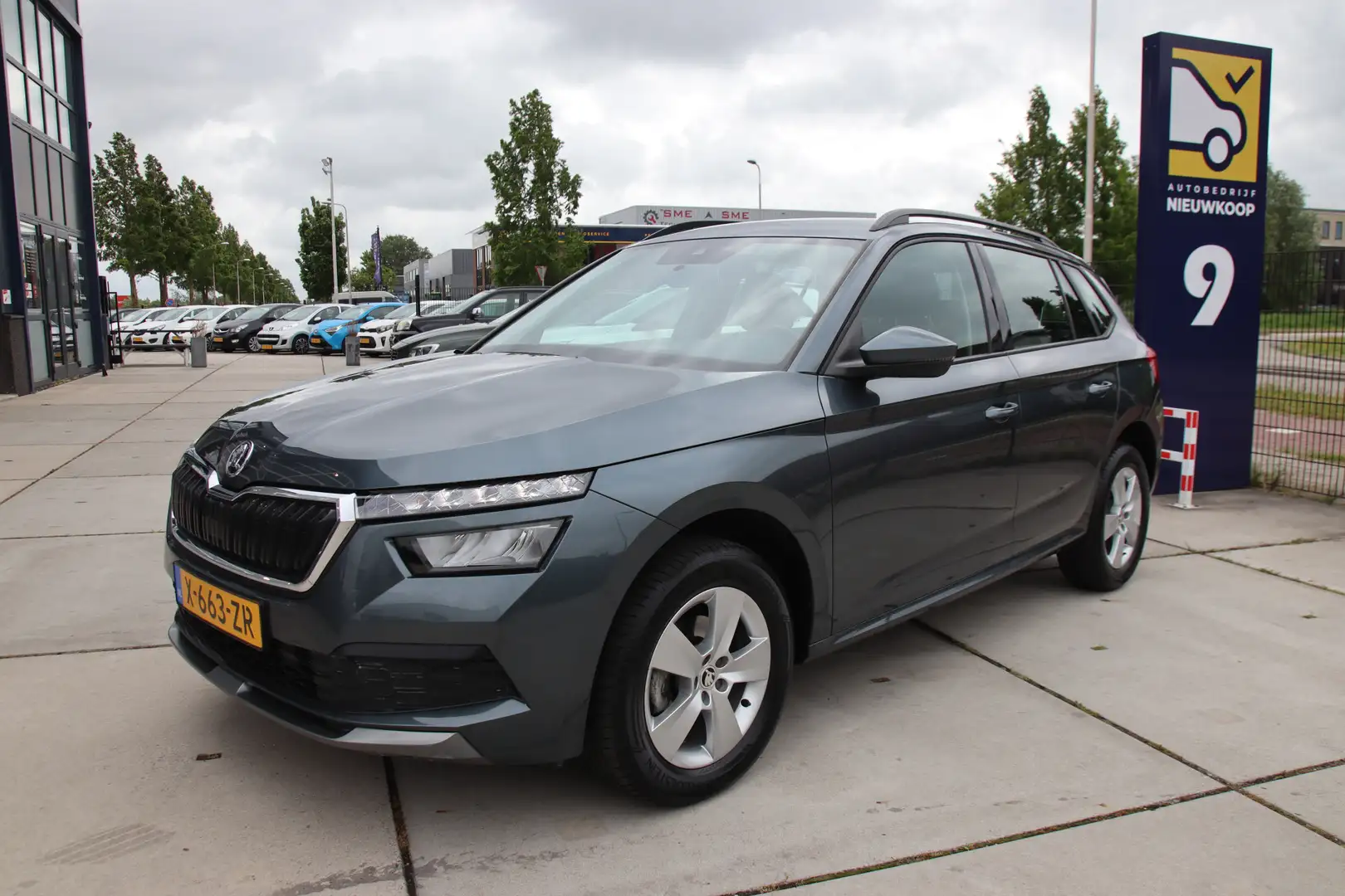 Skoda Kamiq 1.0 TSI DSG Style Business Stoelvw, Camera-Carplay Grigio - 1