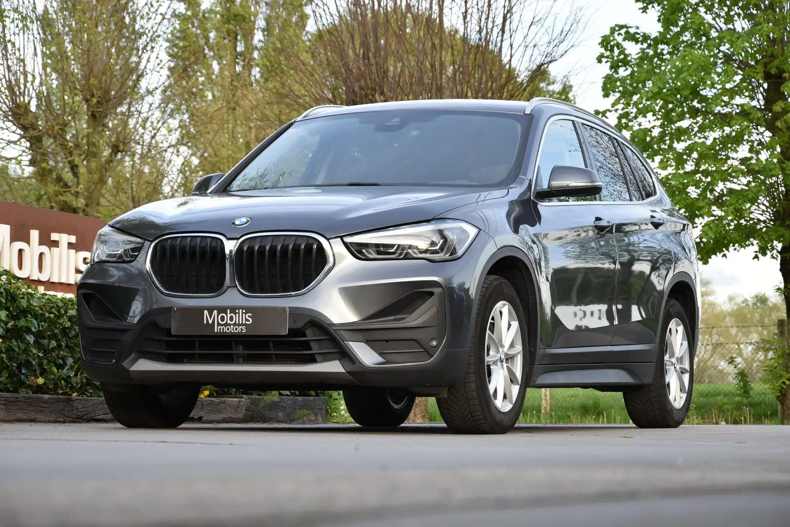 BMW X1 sDrive18i PanoDak/Leder/Camera/NaviPro/Trekhaak Szary - 1
