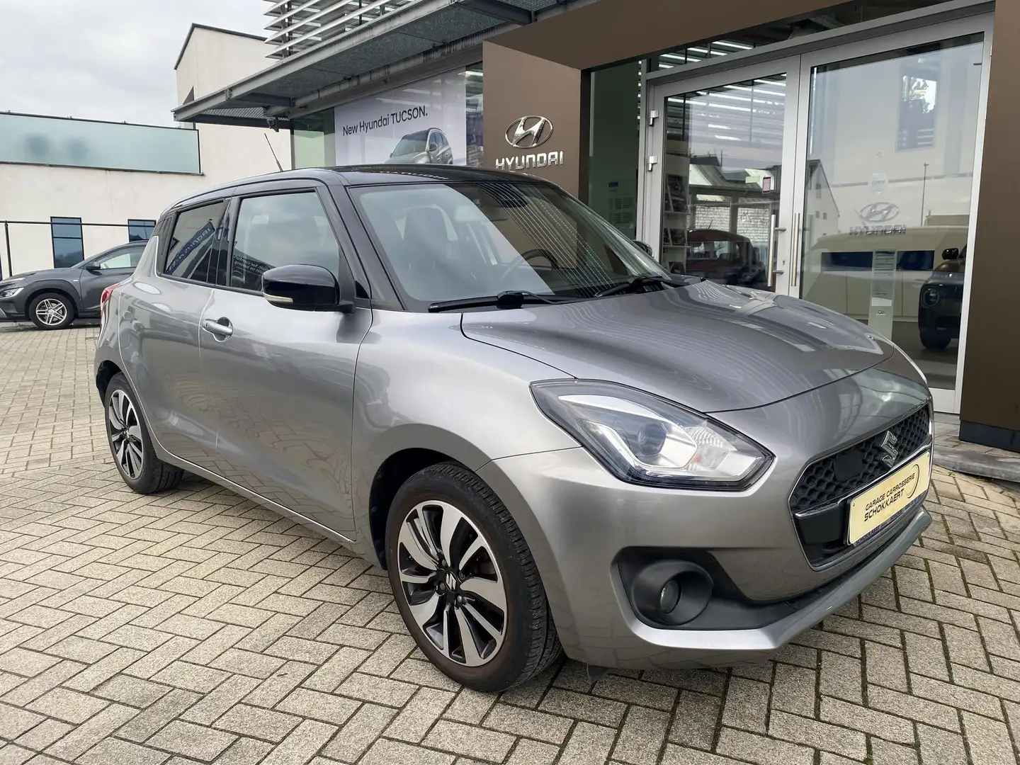 Suzuki Swift Grand Luxe Xtra SHVS (MY20 K12D) Gris - 1