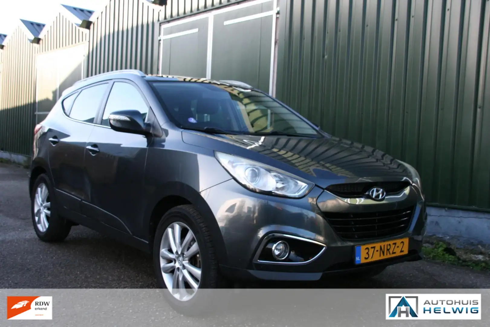 Hyundai iX35 2.0i i-Catcher, LEER, NAVIGATIE, AIRCO, TREKHAAK, Grau - 2