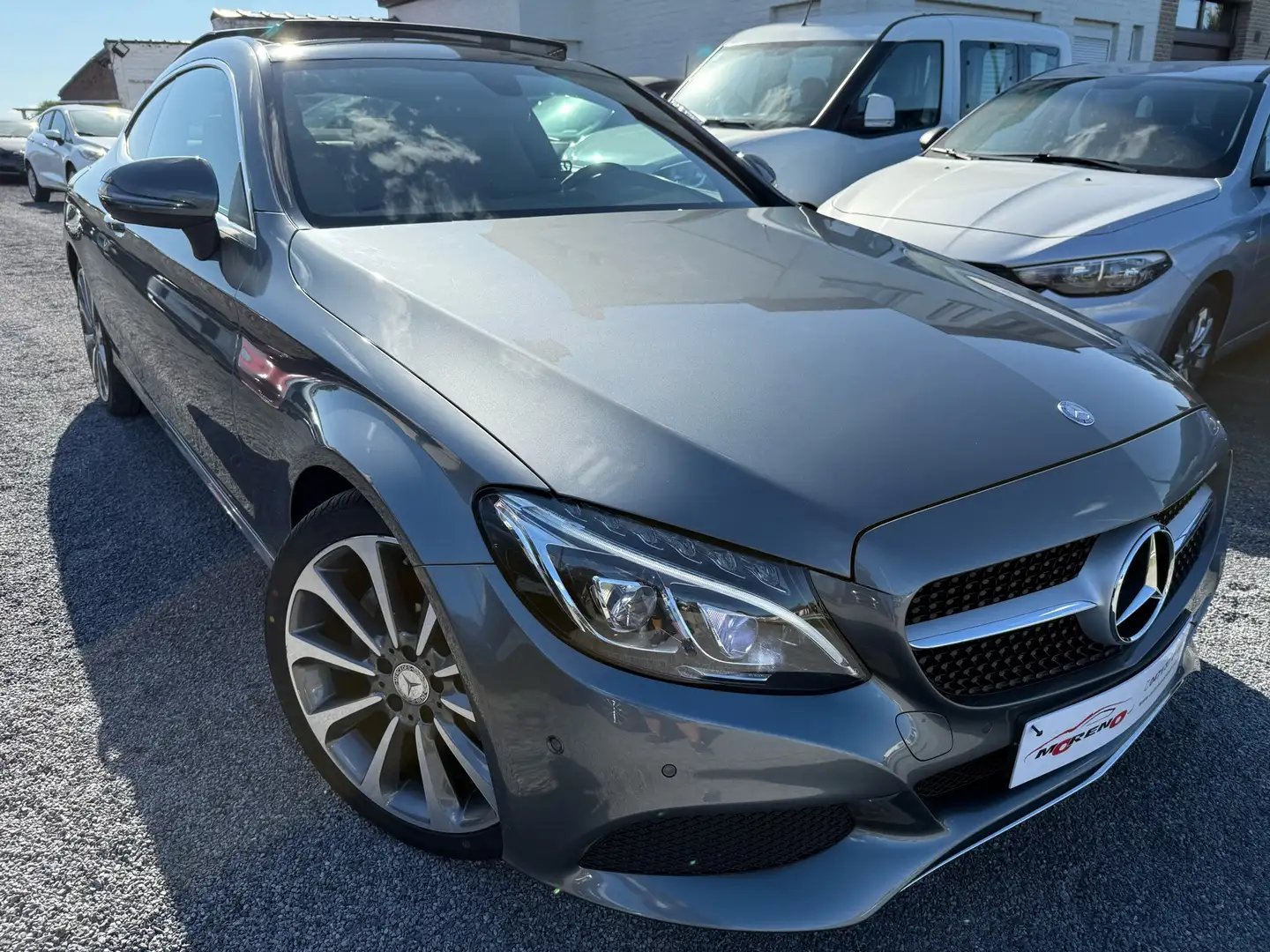 Mercedes-Benz C 200 Coupe 9G-TRONIC panodak leder 12M waarborg Grijs - 1