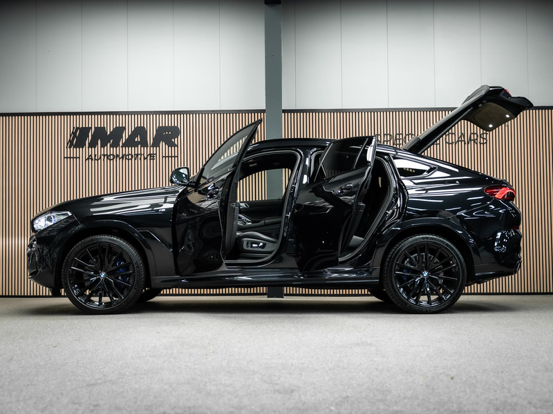 BMW X6 M50i High Executive — photo 9