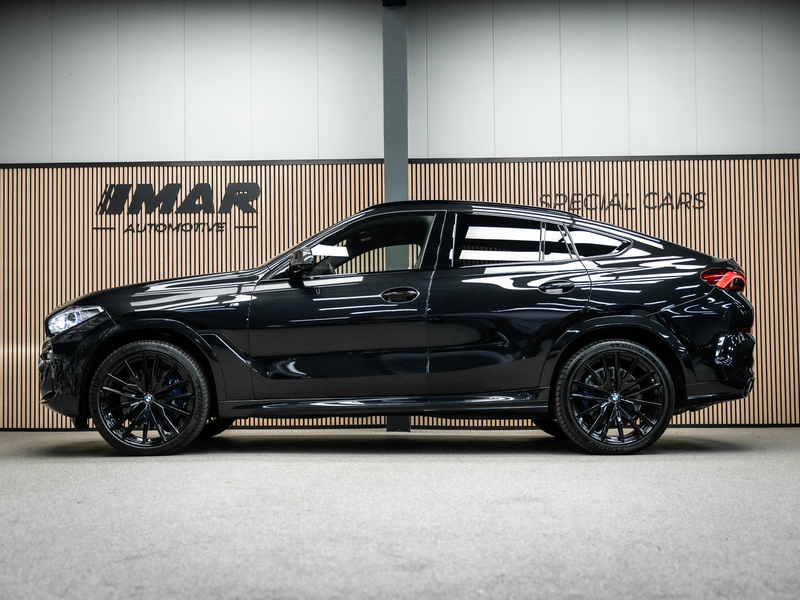 BMW X6 M50i High Executive — photo 8
