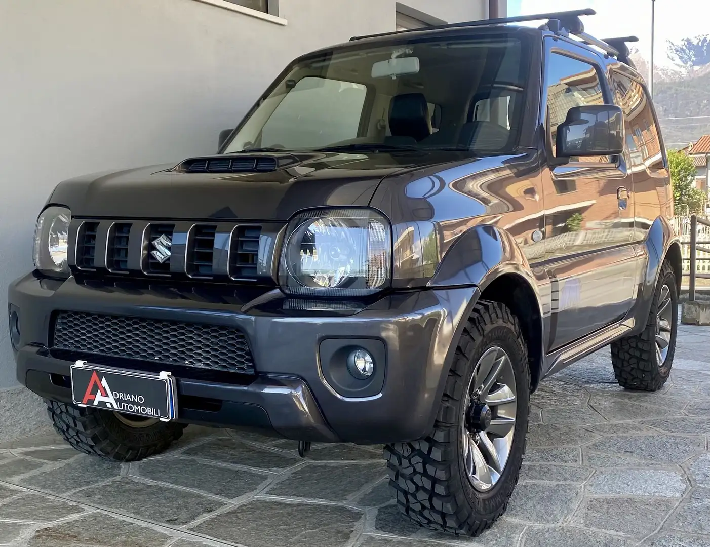 Suzuki Jimny 1.3 4WD Evolution CON GANCIO TRAINO Nero - 1